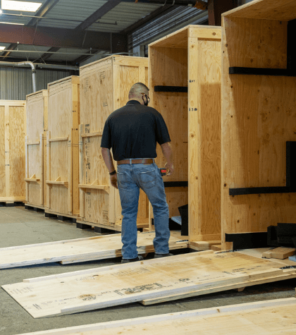 Custom wooden crate with a built in ramp makes for easy loading for heavy products