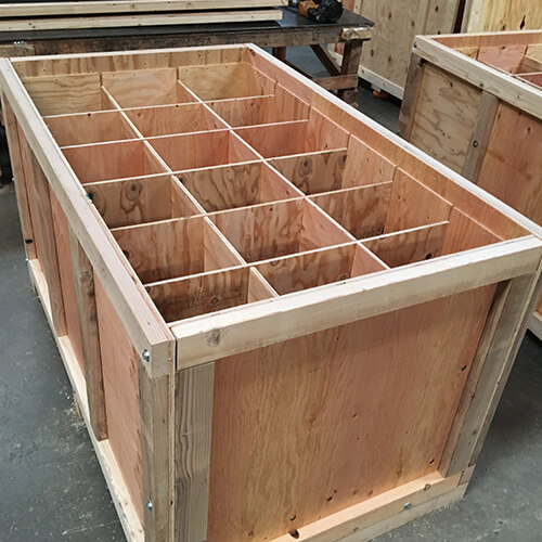 Example of a custom designed wooden crate with interior components to minimize product movement during transit