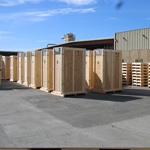 Custom wooden crates sitting in the loading yard ready to ship to the client