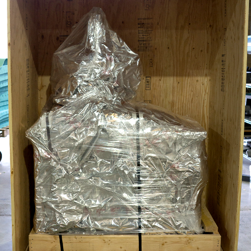 Equipment safely stored in a custom industrial crate made by Larson Packaging Company