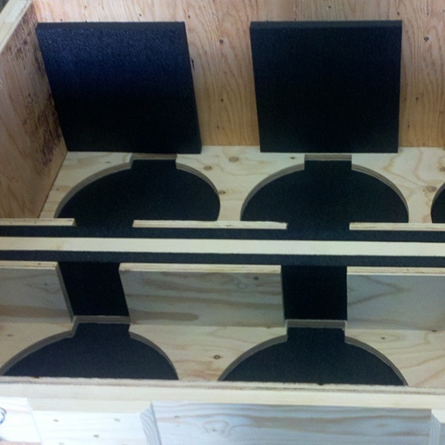 An example of a crate designed to meet size, weight, shape, fragility, sensitivity, and destination of the item to be shipped