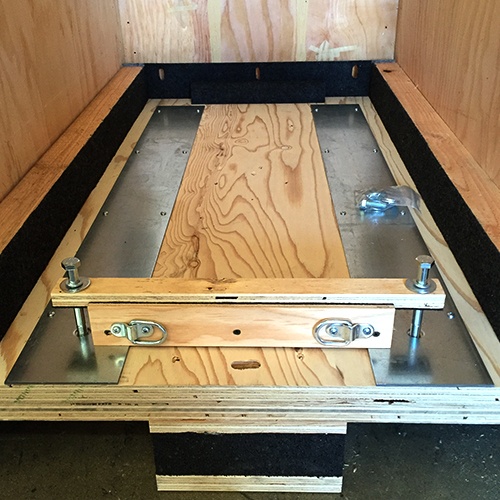 Custom rack crate equipment fixing solution with floater base