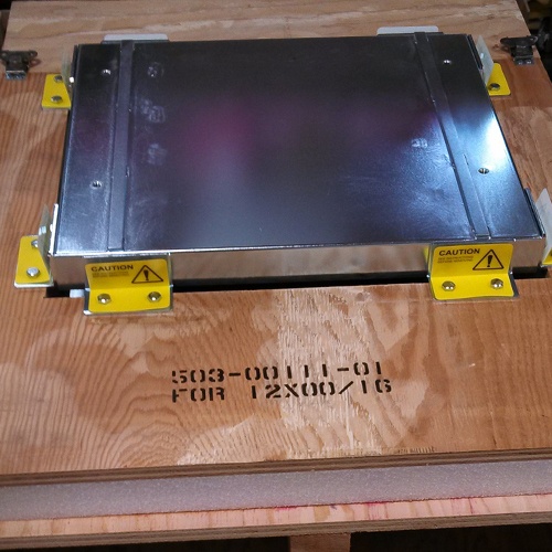 Products sensitive to shock and vibration require additional protection in shipping as shown here with extra brackets securing the equipment