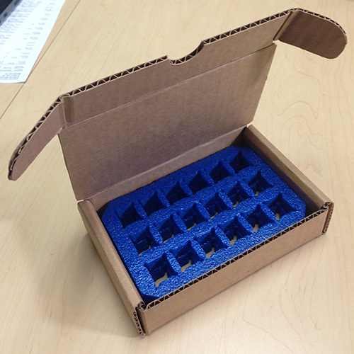 Small custom designed corrugated box with custom foam insert
