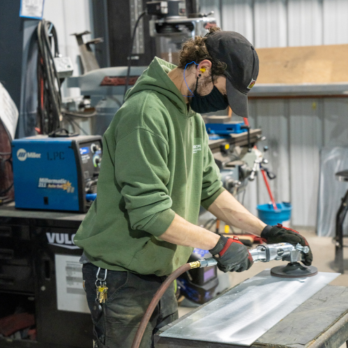 Larson Packaging Company team member fabricating custom packaging at its Milpitas plant