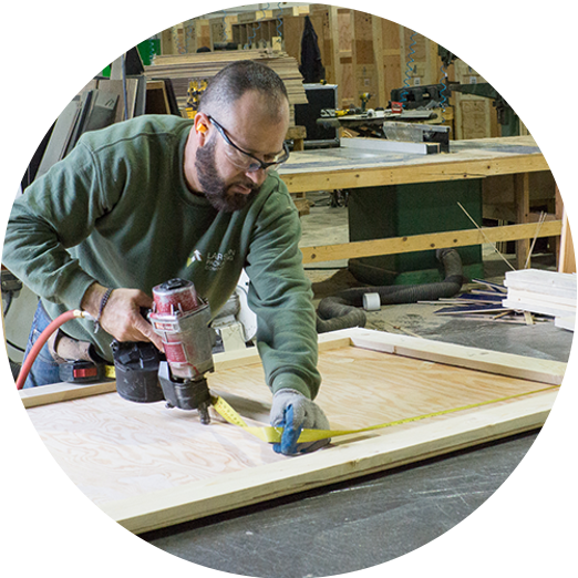 LPC team member manufacturing a wooden server crate