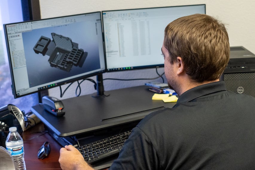 LPC team member designing foam insert for hard case